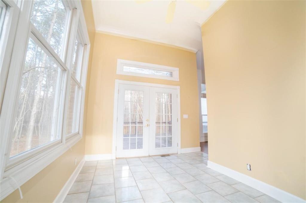 2210 Cammie Wages Road Dacula, GA 30019 - Photo 12 of 32 a view of an empty room with a window