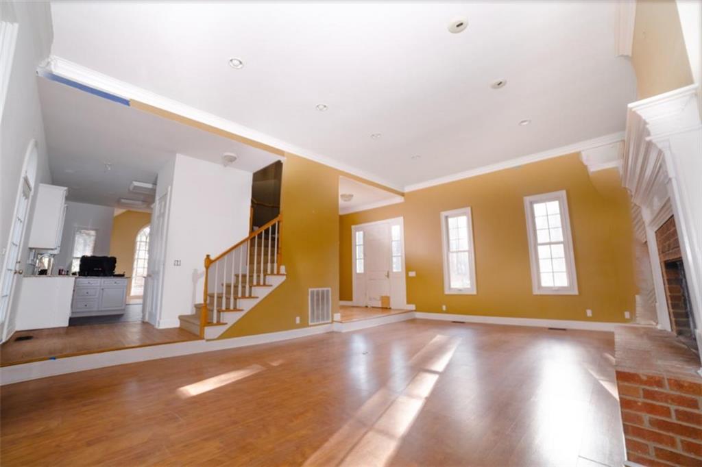 2210 Cammie Wages Road Dacula, GA 30019 - Photo 7 of 32 a view of an entryway with wooden floor