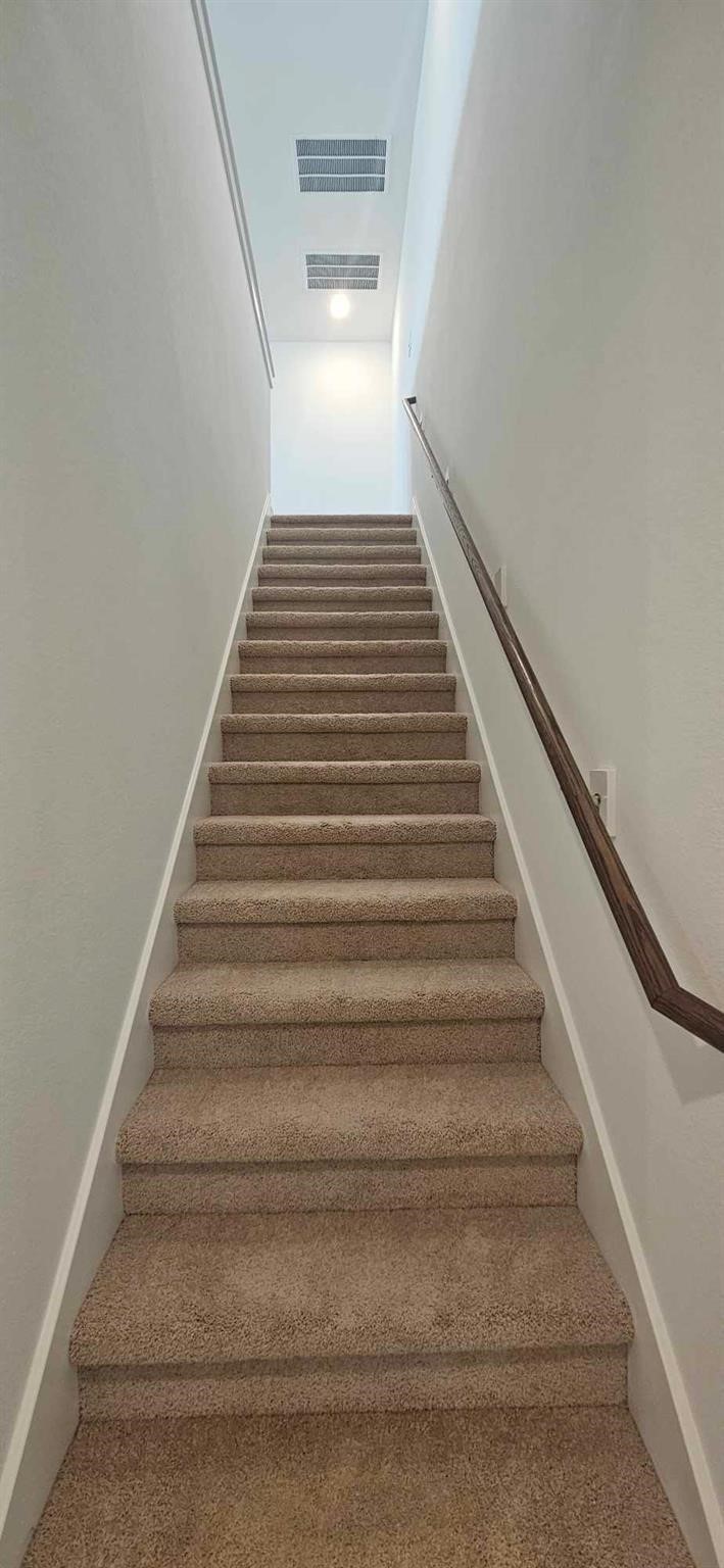 8423 Bay Ridge Drive Baytown, TX 77523 - Photo 23 of 34 Staircases to upstairs