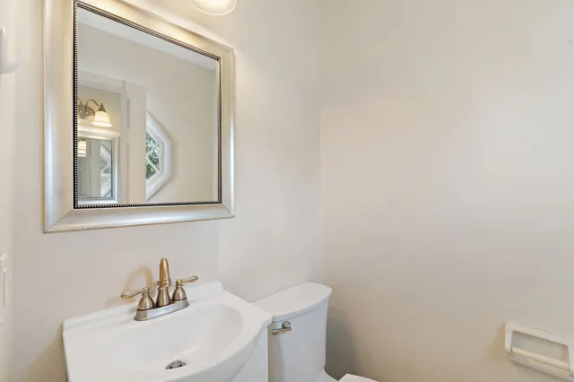 a bathroom with a sink and mirror