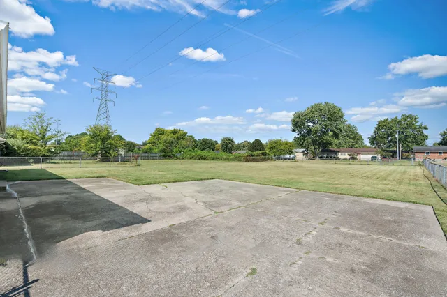a view of a golf course with a lake
