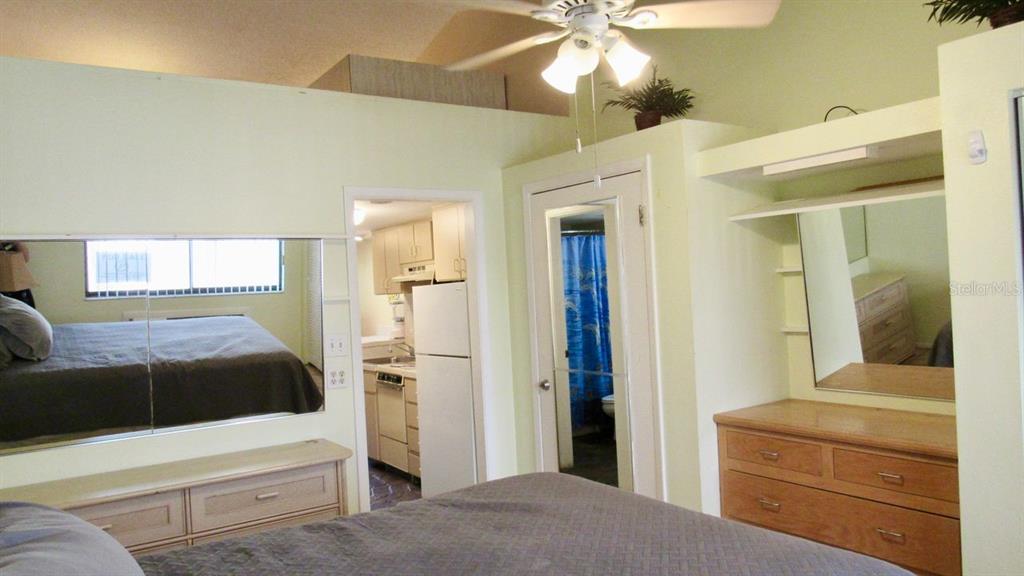 20861 Haulover Cove Road, Unit C4 Lutz, FL 33558 - Photo 7 of 22 a en suite bathroom with a tub and mirror