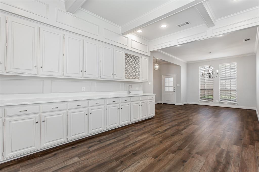2117 Promontory Point Plano, TX 75075 - Photo 12 of 37 a view of a kitchen with electric appliances