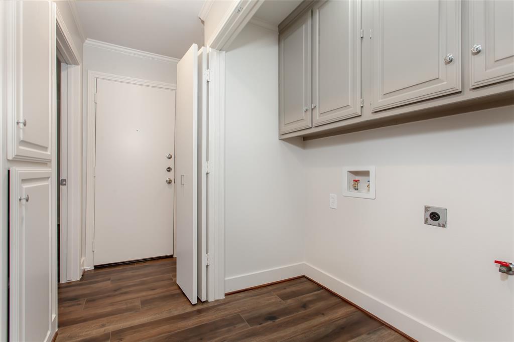 2117 Promontory Point Plano, TX 75075 - Photo 19 of 37 a view of cabinets and wooden floor