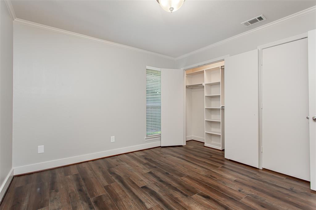 2117 Promontory Point Plano, TX 75075 - Photo 23 of 37 a view of empty room with wooden floor