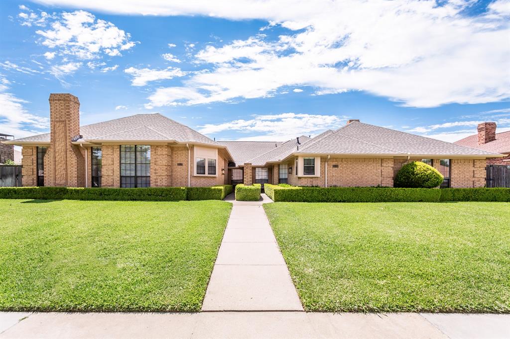 2117 Promontory Point Plano, TX 75075 - Photo 37 of 37 a front view of a house with garden