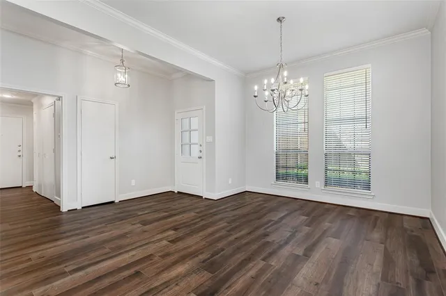 a view of livingroom with window and wooden floor