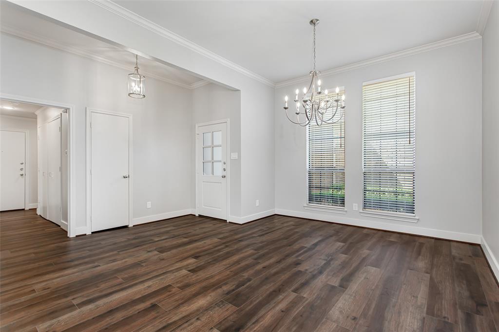 2117 Promontory Point Plano, TX 75075 - Photo 7 of 37 a view of livingroom with window and wooden floor