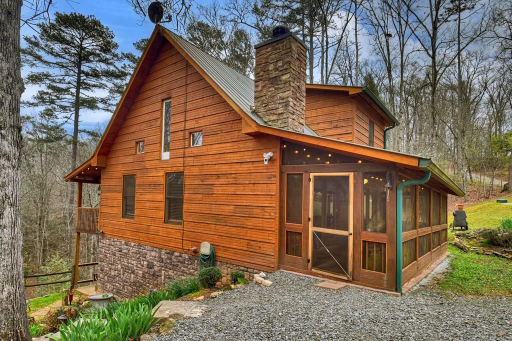 111 Roaring Creek Road Epworth, GA 30541 - Photo 1 of 63 a view of a house with a yard