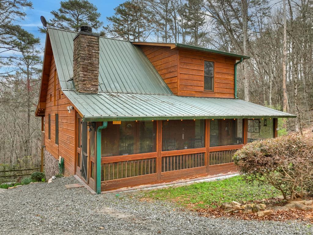 111 Roaring Creek Road Epworth, GA 30541 - Photo 2 of 63 a view of a house with a yard