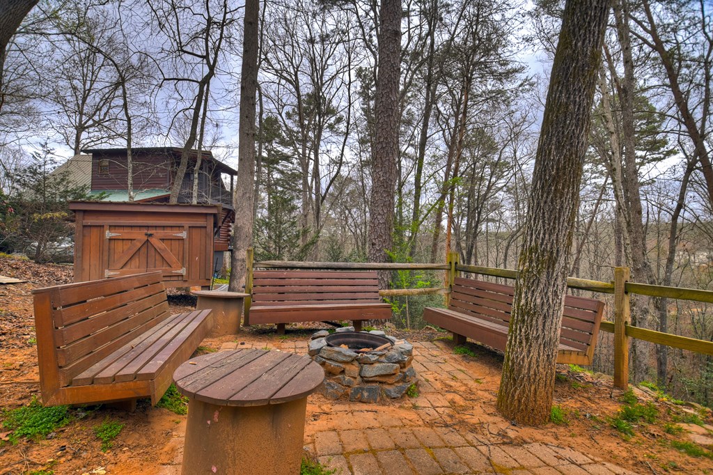 111 Roaring Creek Road Epworth, GA 30541 - Photo 21 of 63 a view of a patio with iron fence