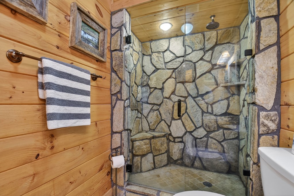 111 Roaring Creek Road Epworth, GA 30541 - Photo 41 of 63 a bathroom with a shower and a sink