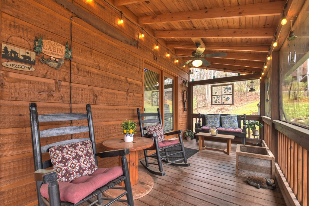 111 Roaring Creek Road Epworth, GA 30541 - Photo 54 of 63 a outdoor living space with furniture