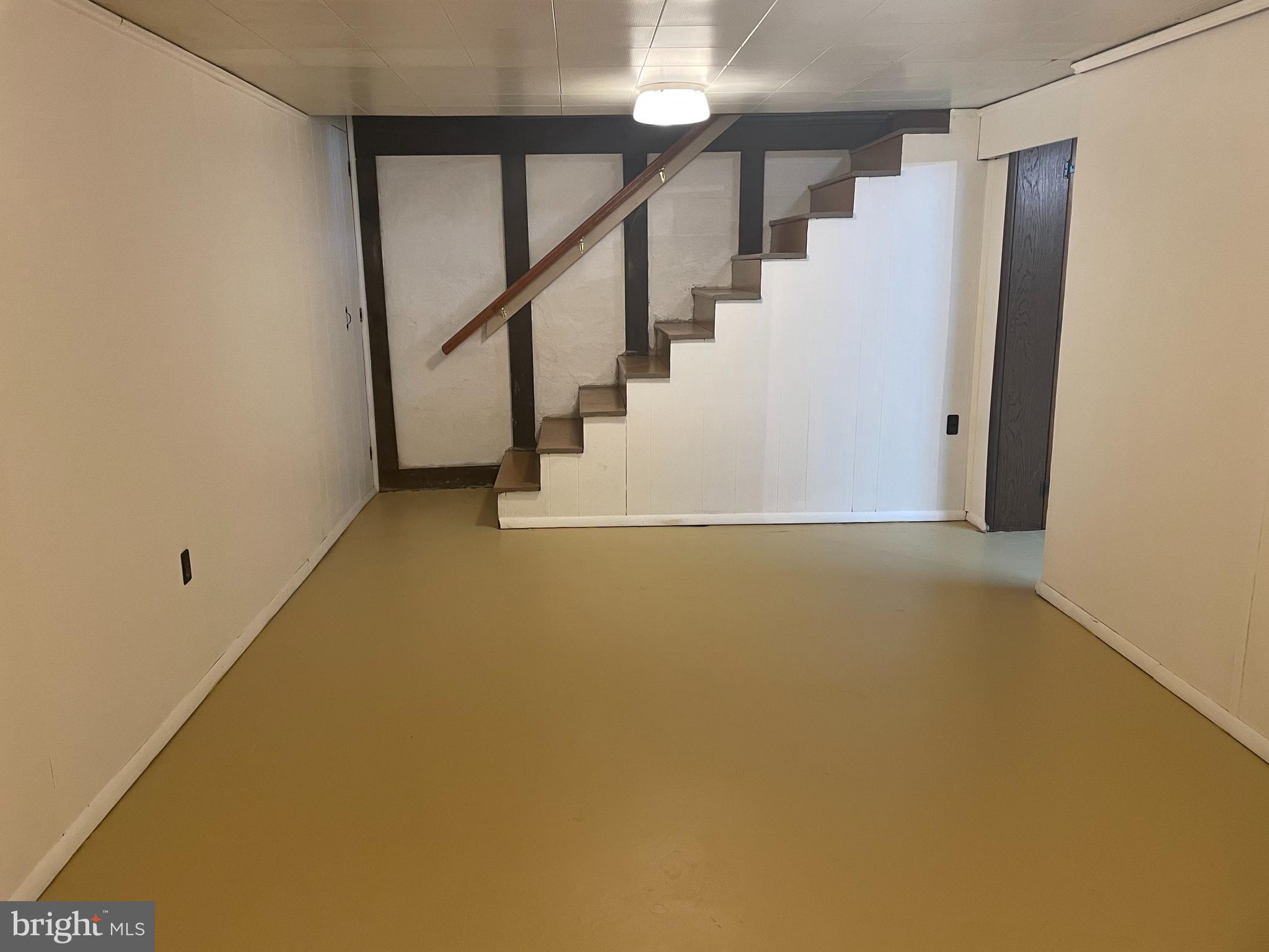 615 Overbrook Road Baltimore, MD 21212 - Photo 39 of 48 a view of an empty room with stairs