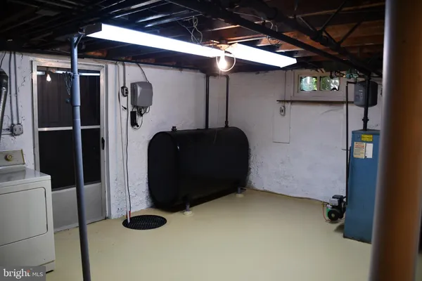 a room with a table and chairs