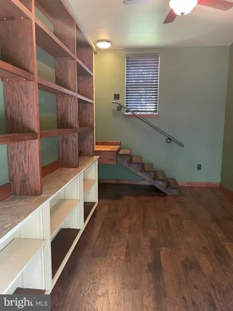 a storage room with wooden floor