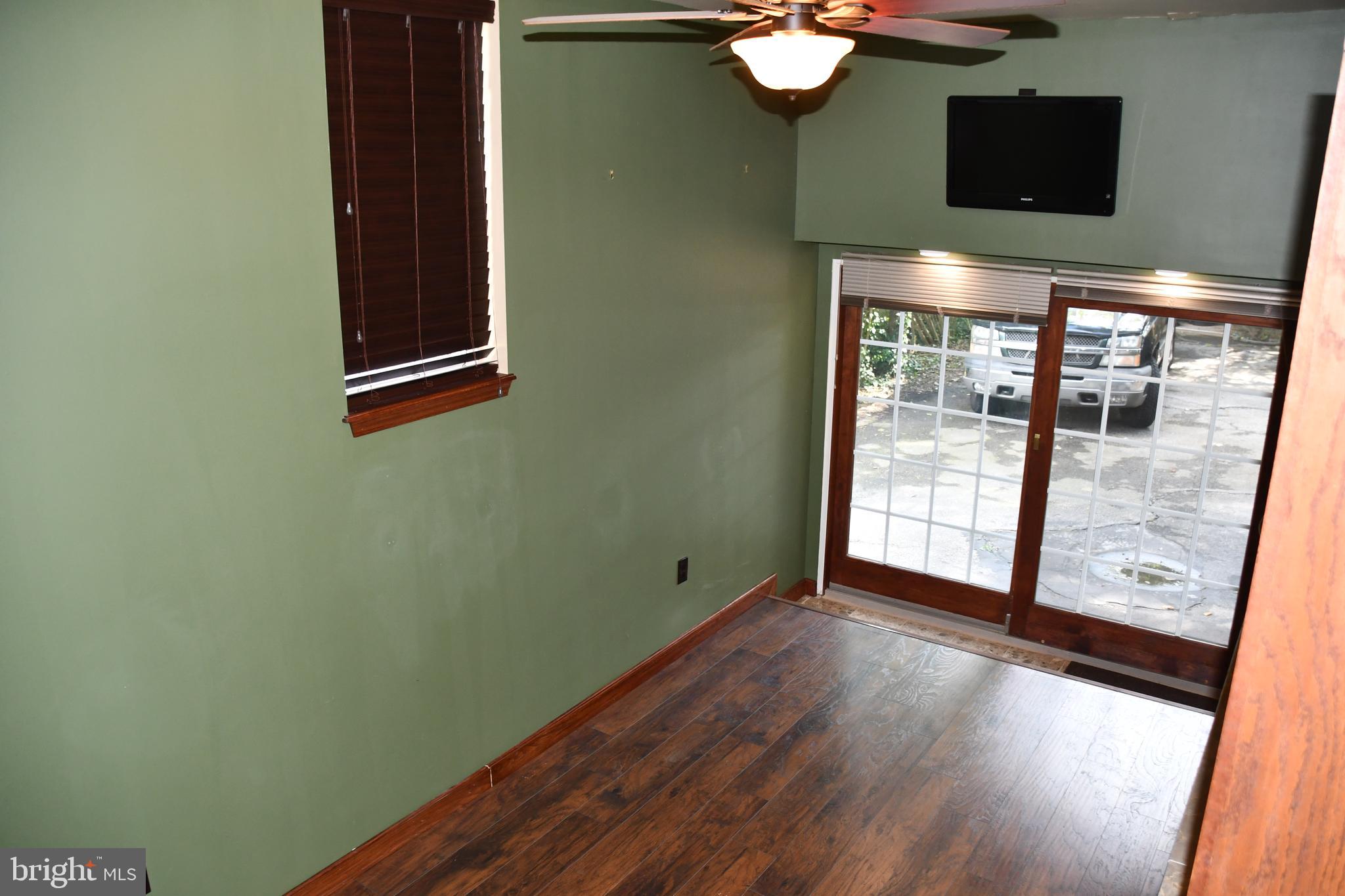 615 Overbrook Road Baltimore, MD 21212 - Photo 9 of 48 a view of a livingroom with wooden floor