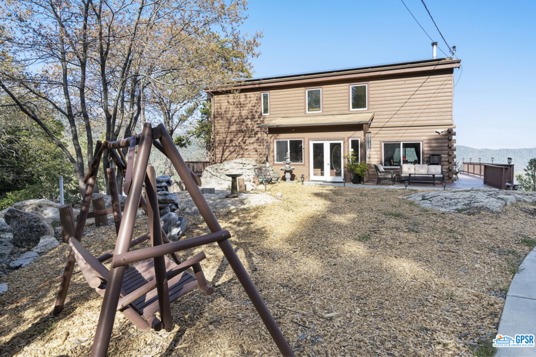53305 Big Rock Drive Idyllwild, CA 92549 - Photo 11 of 67 a view of a house with backyard and sitting area