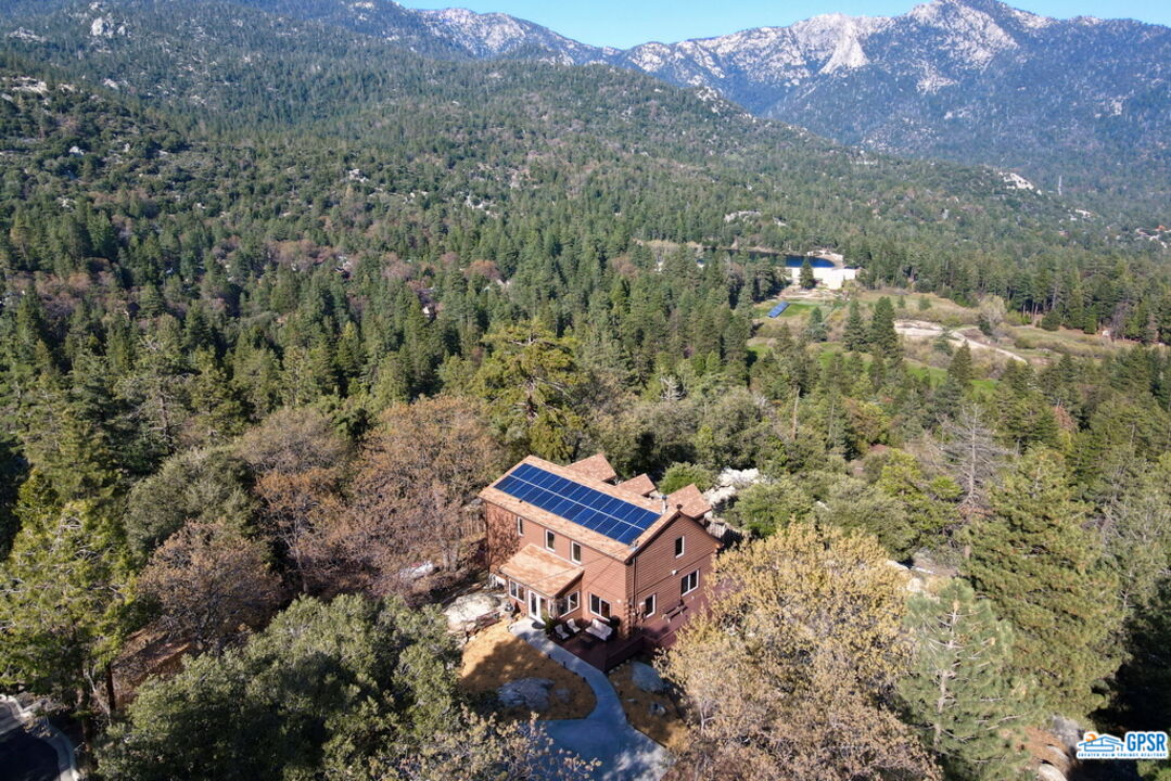 53305 Big Rock Drive Idyllwild, CA 92549 - Photo 3 of 67 an aerial view of a house with a yard