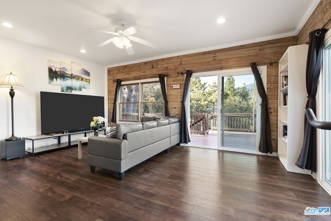 53305 Big Rock Drive Idyllwild, CA 92549 - Photo 32 of 67 a living room with furniture and a flat screen tv