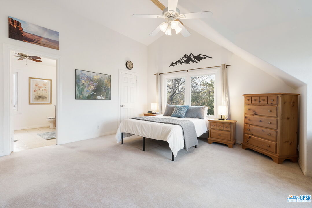 53305 Big Rock Drive Idyllwild, CA 92549 - Photo 36 of 67 a bedroom with a bed dresser and a window