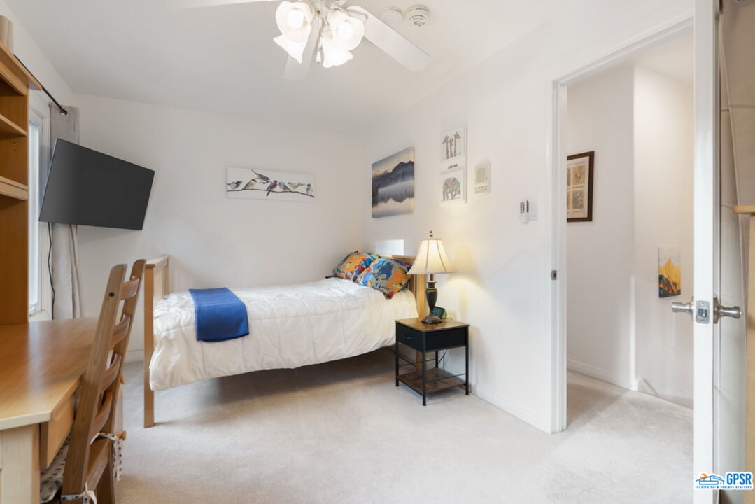 53305 Big Rock Drive Idyllwild, CA 92549 - Photo 42 of 67 a bedroom with bed and a flat screen tv