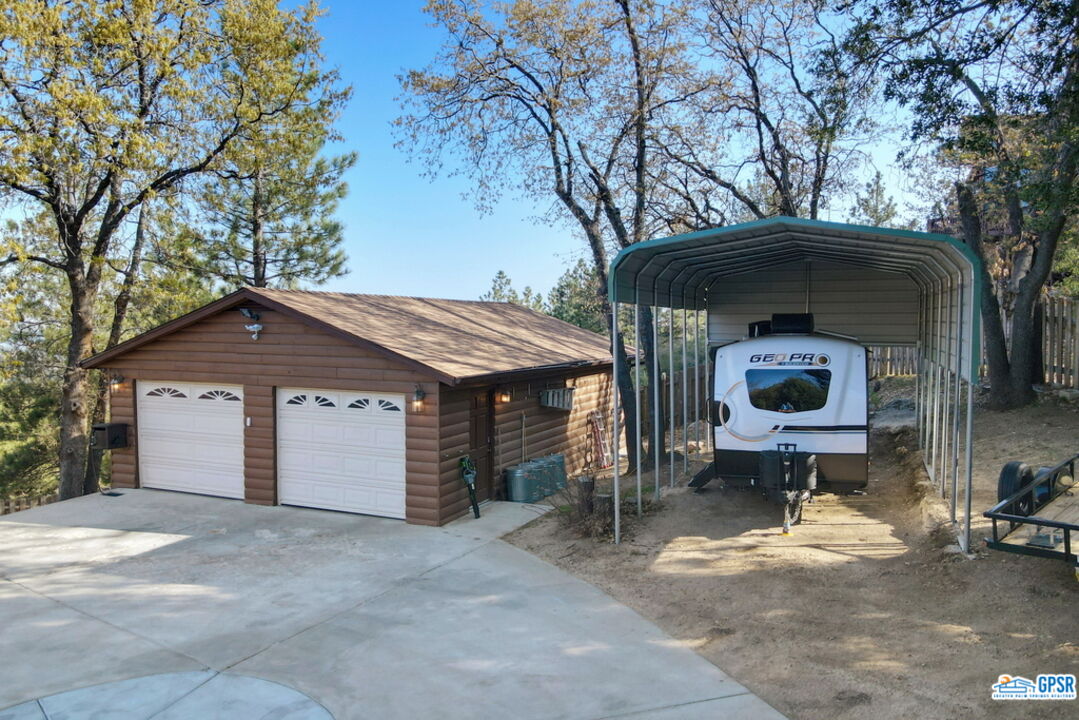 53305 Big Rock Drive Idyllwild, CA 92549 - Photo 48 of 67 a front view of a house with garden