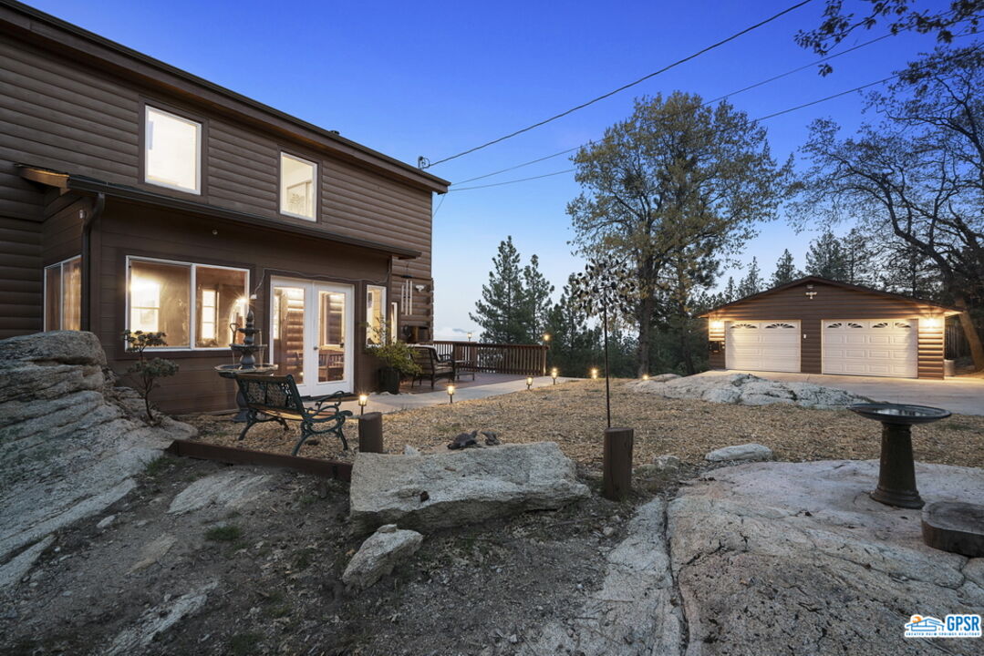 53305 Big Rock Drive Idyllwild, CA 92549 - Photo 56 of 67 a view of a house with backyard and sitting area