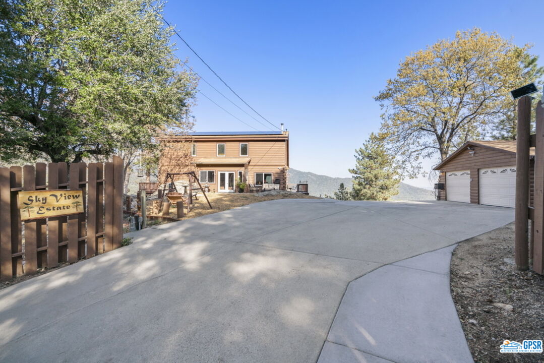 53305 Big Rock Drive Idyllwild, CA 92549 - Photo 8 of 67 a view of a house with a yard