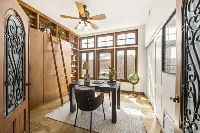 a view of a dining room with furniture window and outside view