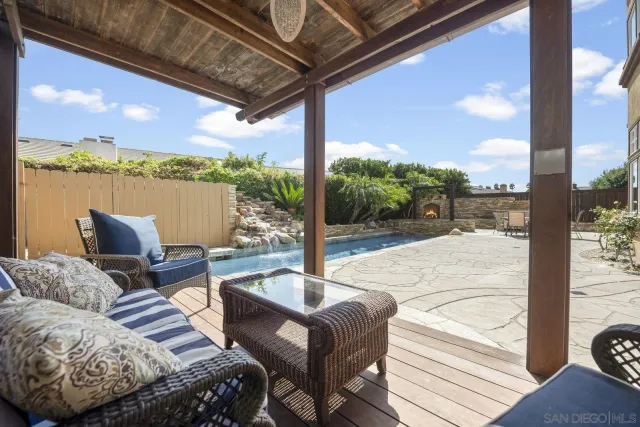 a outdoor living space with patio furniture and a potted plant