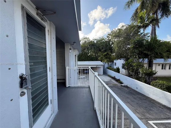 a hallway with a stove top oven