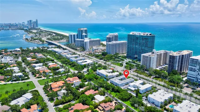 a view of a back yard from a balcony