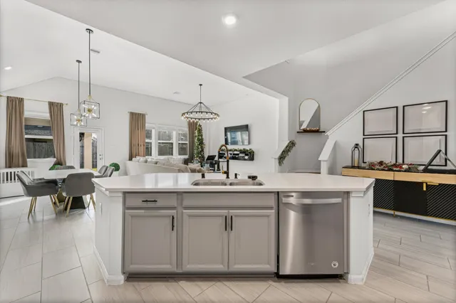 a kitchen with a sink and cabinets