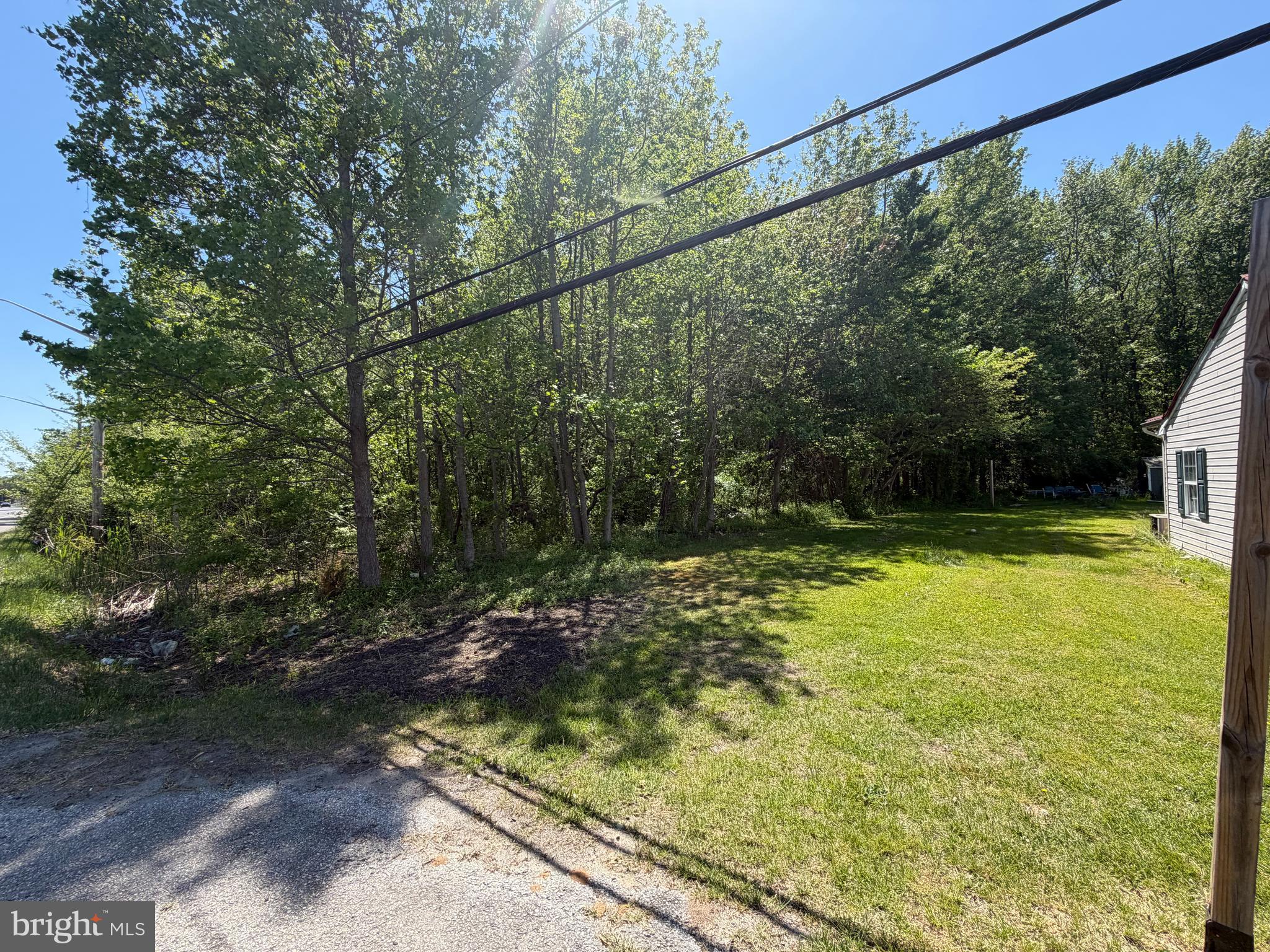 6386 Summit Bridge Road Townsend, DE 19734 - Photo 2 of 8 a view of a yard with an outdoor space