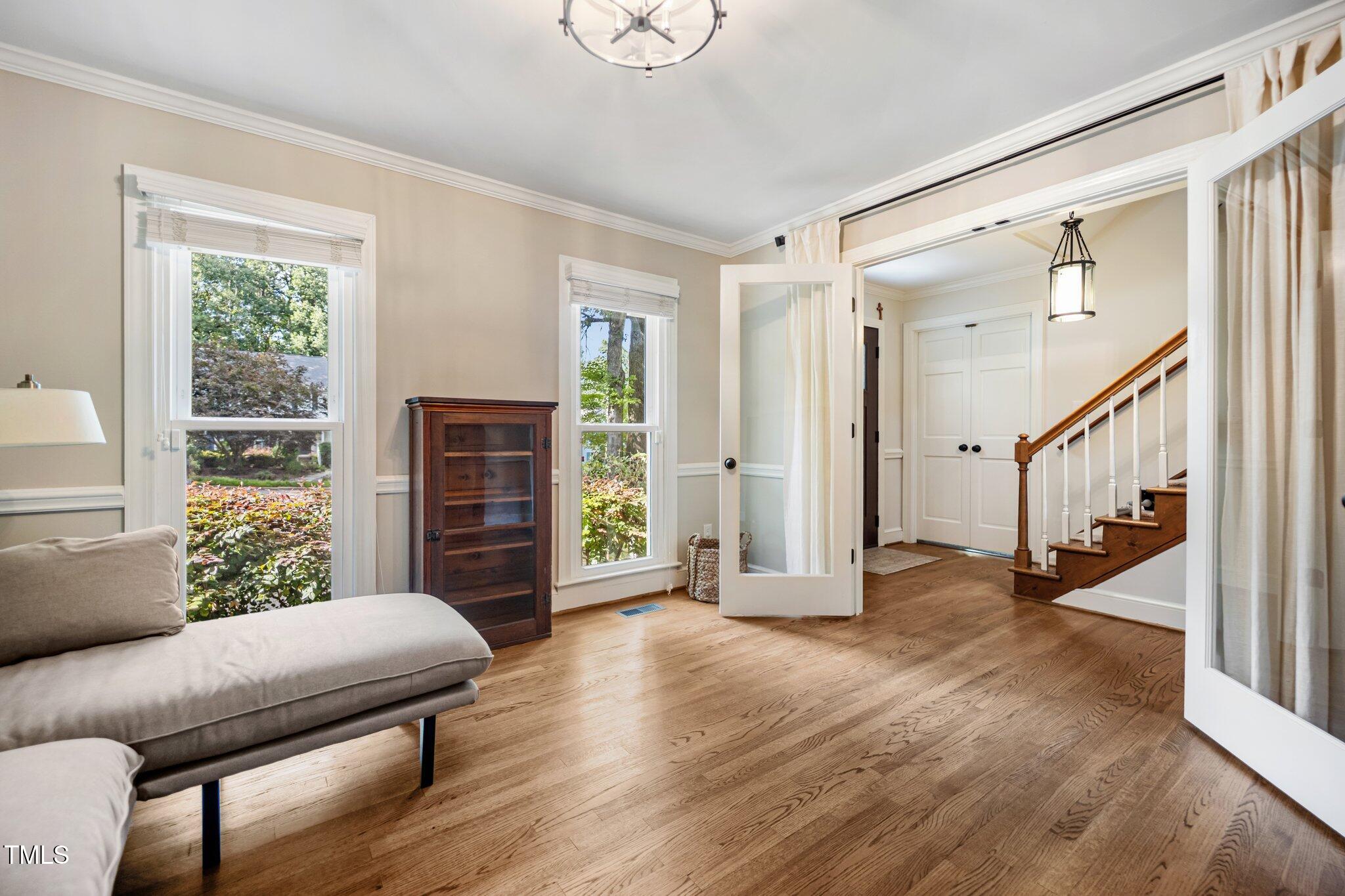 2409 Basil Drive Raleigh, NC 27612 - Photo 5 of 44 a living room with furniture and a window