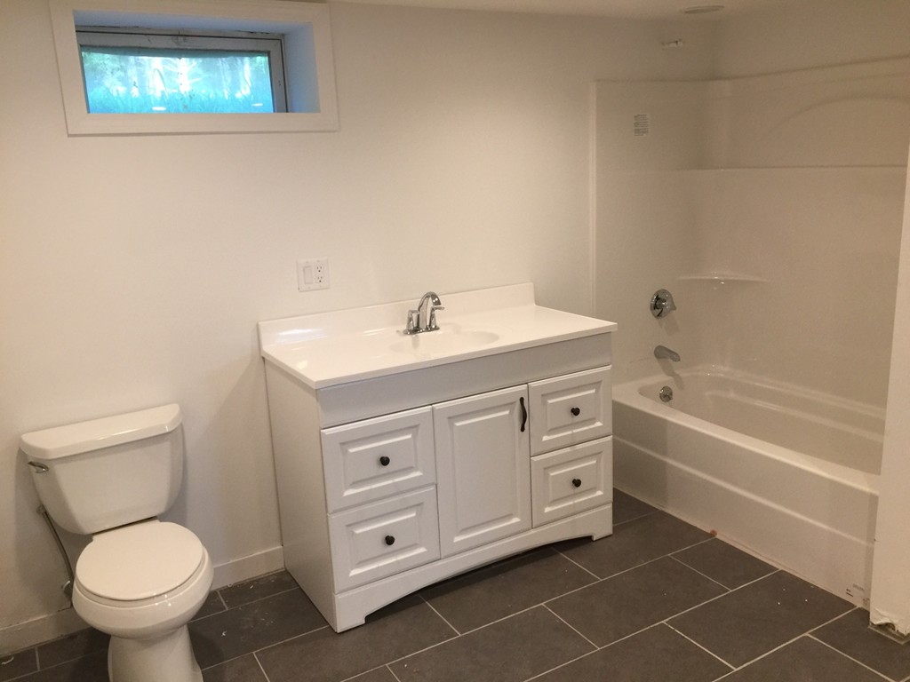 7 Chapman Road Boxford, MA 01921 - Photo 17 of 22 a spacious bathroom with a toilet a sink and a bathtub