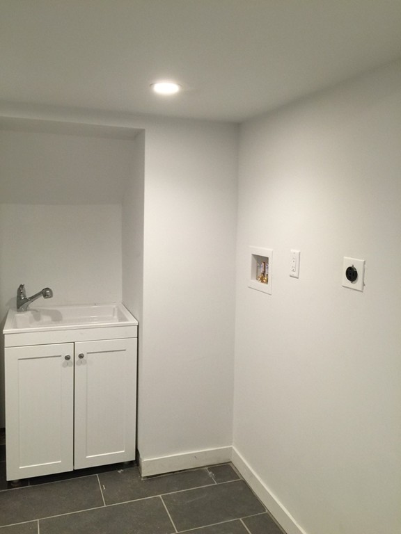 7 Chapman Road Boxford, MA 01921 - Photo 18 of 22 a view of a storage & utility room with a sink
