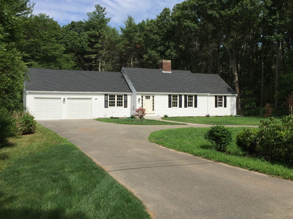 7 Chapman Road Boxford, MA 01921 - Photo 3 of 22 a house view with a garden space