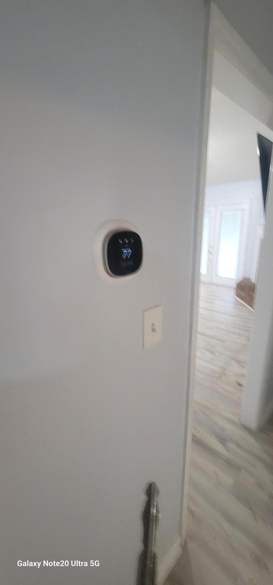 10 Cardinal Court Palm Coast, FL 32137 - Photo 30 of 32 THERMOSTAT 4