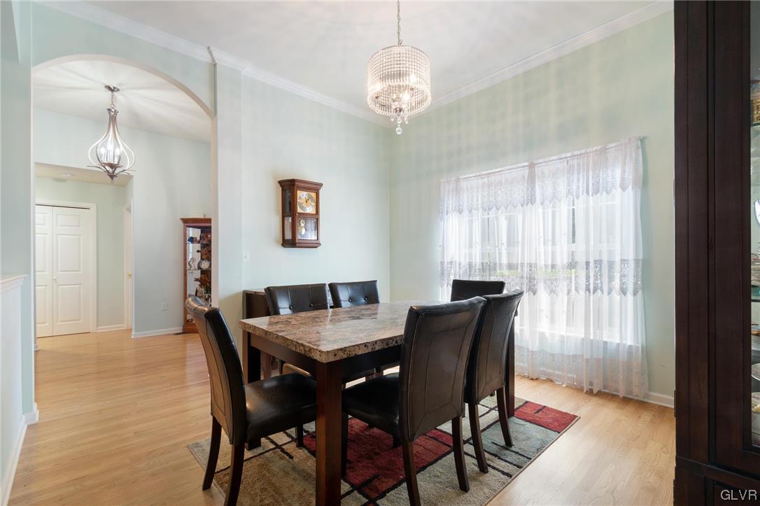 1206 Shiloh Road Allentown, PA 18106 - Photo 11 of 28 a view of a dining room with furniture window and wooden floor