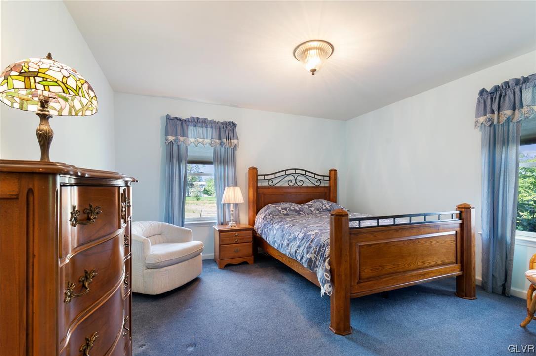 1206 Shiloh Road Allentown, PA 18106 - Photo 22 of 28 a bedroom with a bed and a window