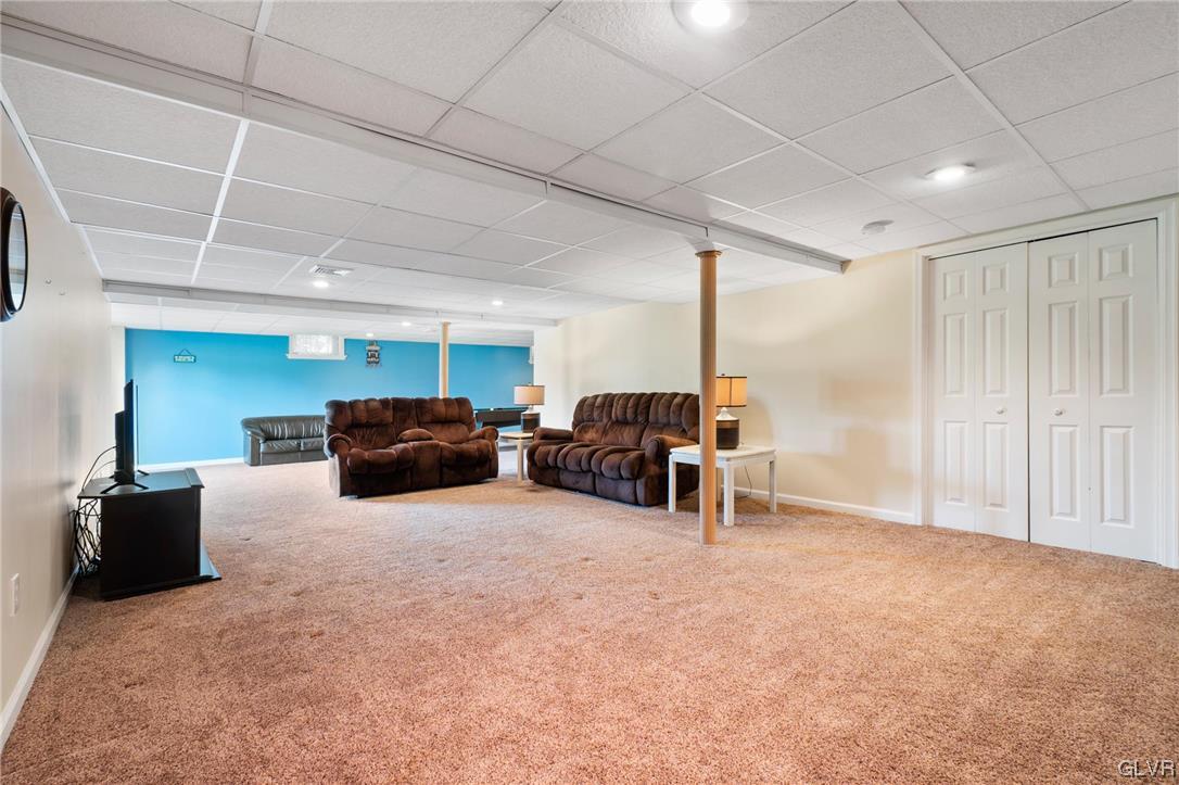 1206 Shiloh Road Allentown, PA 18106 - Photo 27 of 28 a living room with furniture and a flat screen tv