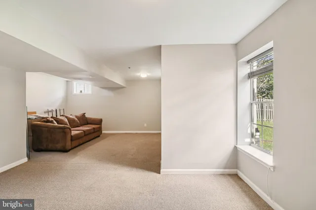 a view of a livingroom with a workspace