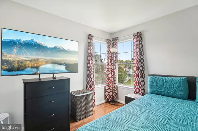 a view of a wooden deck with furniture