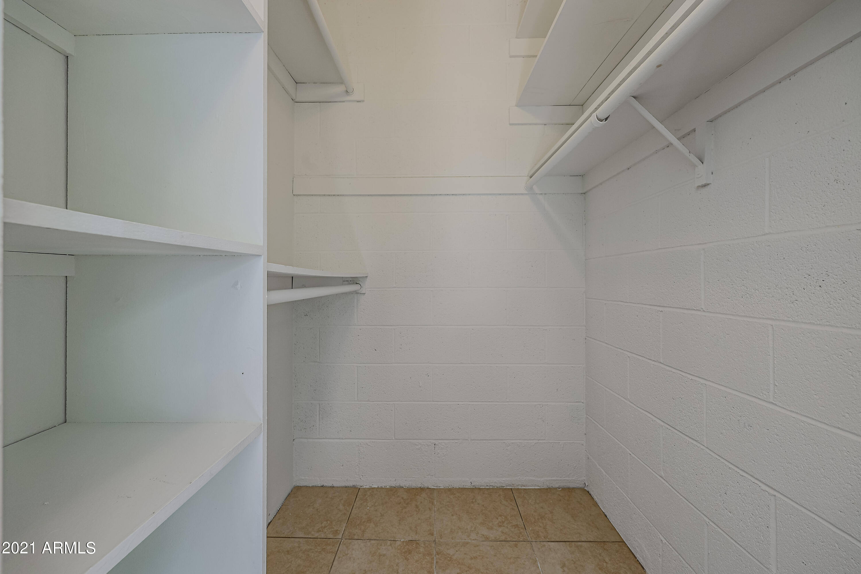 4041 East Camelback Road, Unit 3 Phoenix, AZ 85018 - Photo 20 of 22 Built in closet shelving