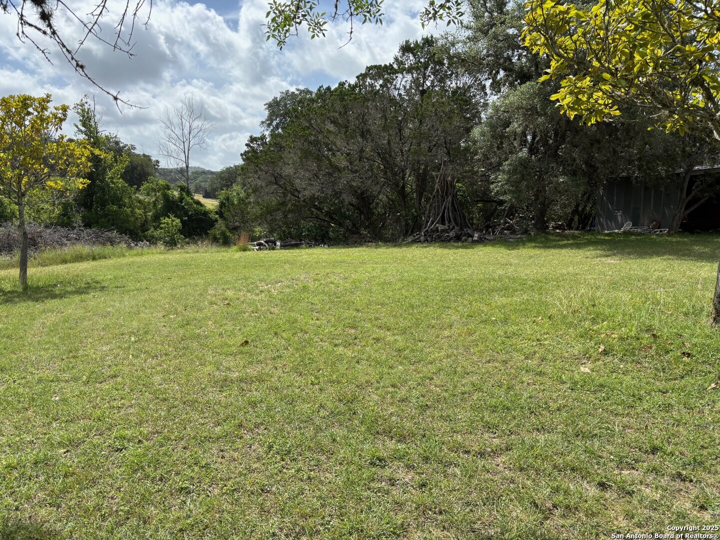 952 Madrona Road Pipe Creek, TX 78063 - Photo 17 of 33 a view of outdoor space and yard