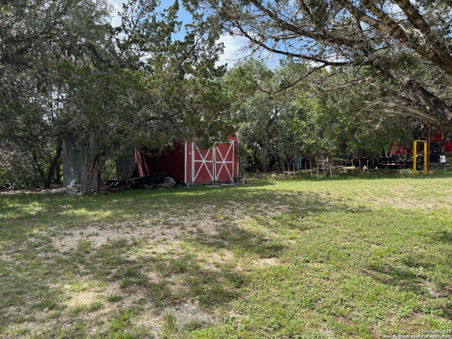 952 Madrona Road Pipe Creek, TX 78063 - Photo 26 of 33 a view of a backyard