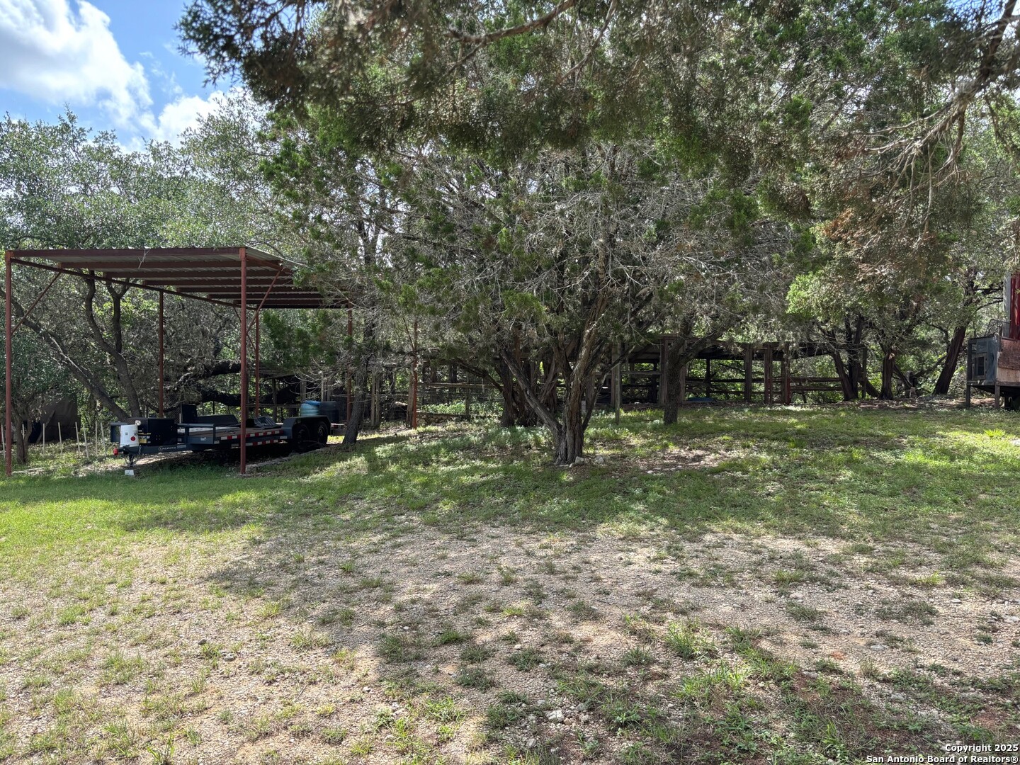 952 Madrona Road Pipe Creek, TX 78063 - Photo 29 of 33 a view of a house with backyard