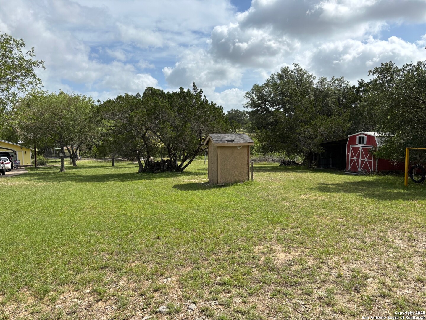 952 Madrona Road Pipe Creek, TX 78063 - Photo 31 of 33 a fire hydrant in the middle of a field